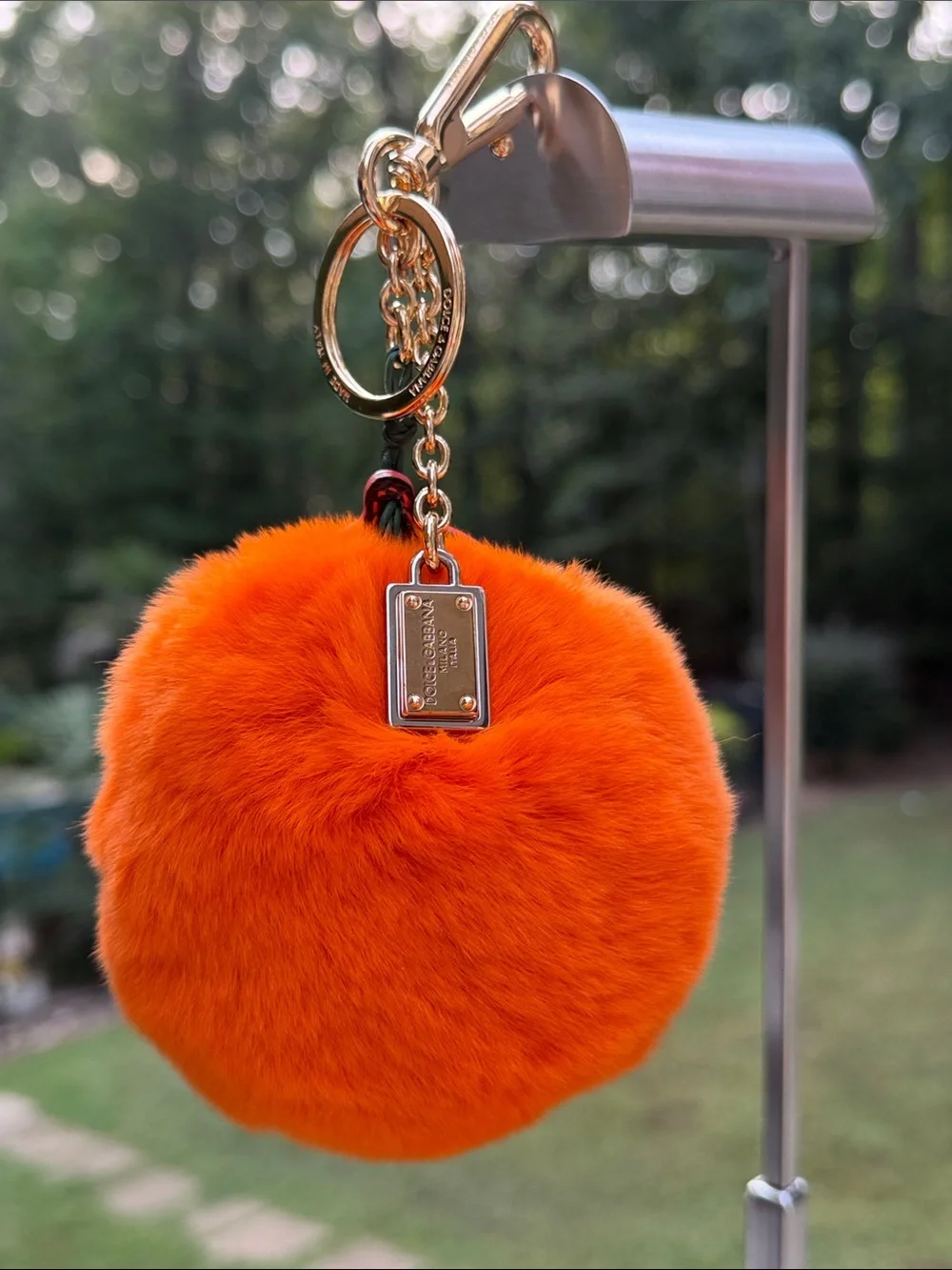 Dolce & Gabbana Orange  Mink Fur Pom-Pom Keychain with Black Leaf Accent